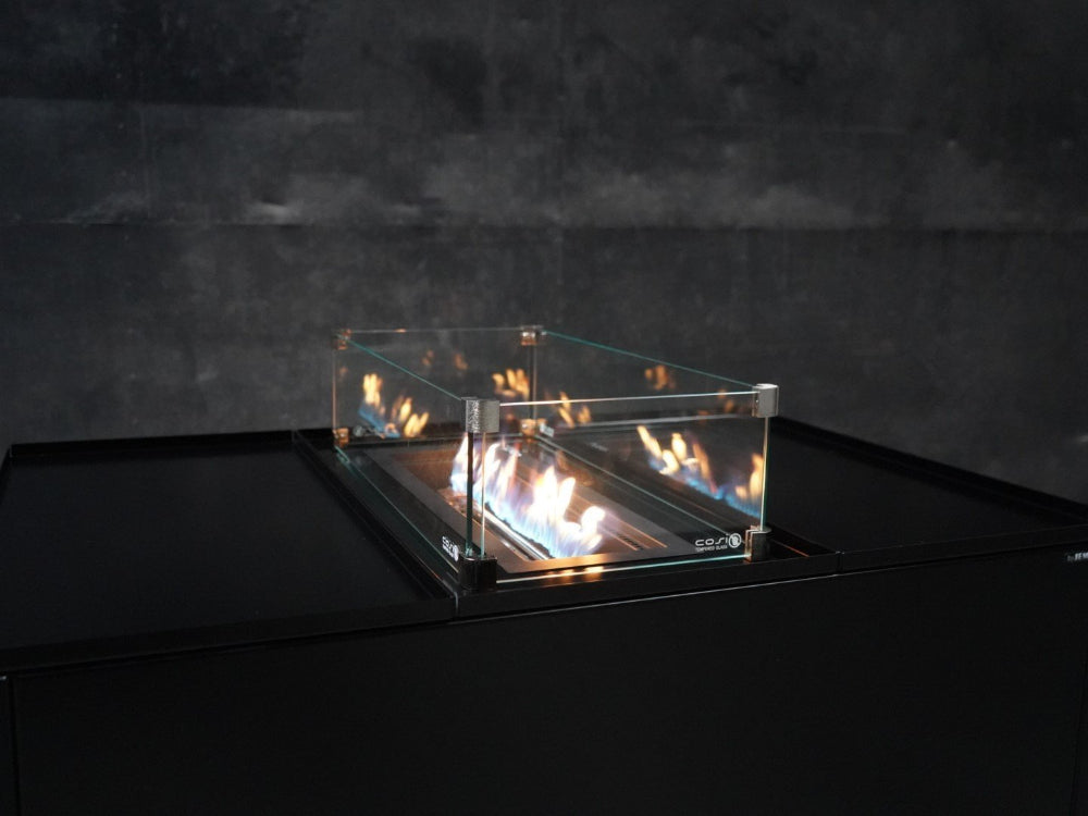 Glas till eldbord som vindskydd